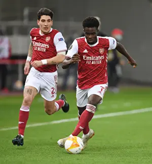 Arsenal V SL Benfica 2020-21 Prints: Arsenal's Bellerin and Saka in Action against SL Benfica in Europa League Round of 32