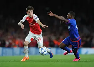 Arsenal V Olympiacos 2015/16 Prints: Arsenal's Bellerin vs. Seba: A Champion's Clash in the 2015 Arsenal v Olympiacos Showdown