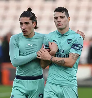 AFC Bournemouth V Arsenal 2018-19 Prints: Arsenal's Bellerin and Xhaka Share a Moment after AFC Bournemouth Clash (2018-19)