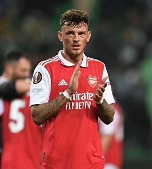 Sporting Lisbon v Arsenal 2022-23 Collection: Arsenal's Ben White Applauding Fans after Europa League Victory over Sporting CP