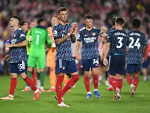 Brentford V Arsenal 2021-22 Prints: Arsenal's Ben White Celebrates with Fans: Brentford Victory in 2021-22 Premier League