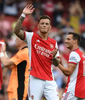 Arsenal's Ben White Celebrates with Fans after Victory over Norwich City