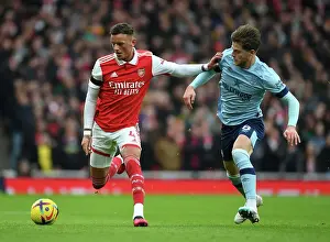 Arsenal's Ben White Clashes with Brentford's Mathias Jensen in Premier League Showdown