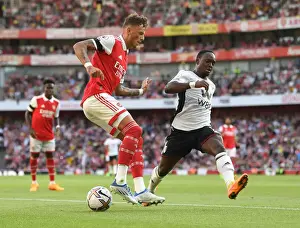 Arsenal's Ben White Faces Off Against Fulham's Neeskens Kebano in 2022-23 Premier League Clash