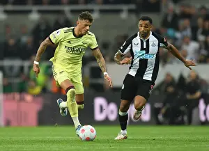Arsenal's Ben White Faces Off Against Newcastle's Callum Wilson in Premier League Clash