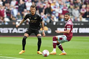 West Ham United V Arsenal 2022-23 Prints: Arsenal's Ben White Faces Off Against West Ham's Said Benrahma in Premier League Clash