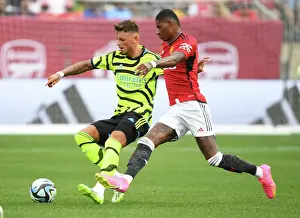 Arsenal V Manchester United - Pre Season 2023-24 Prints: Arsenal's Ben White Outmaneuvers Manchester United's Marcus Rashford in Pre-Season Clash