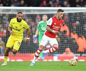 Arsenal's Ben White Outsmarts Brentford's Mbeumo: A Premier League Showdown at Emirates Stadium
