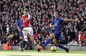 Images Dated 8th November 2008: Arsenal's Bendtner vs. Manchester United's Ferdinand: A Rivalry Ignites in the 2008 Barclays