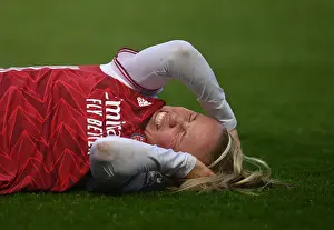 Arsenal Women V West Ham United Women 2020-21 Prints: Arsenal's Beth Mead in Deep Thought: Pondering Her Next Move Against West Ham Amidst Empty Stands (FA WSL)