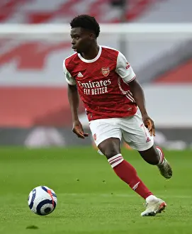 Arsenal's Bukayo Saka in Action: 2020-21 Premier League Match Against Manchester City (Behind Closed Doors)
