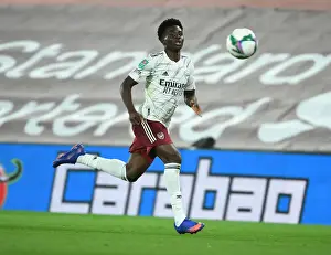 Arsenal's Bukayo Saka in Action at Empty Anfield: Carabao Cup Match vs. Liverpool, 2020