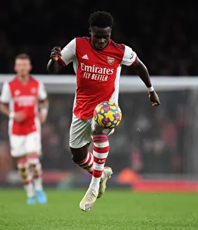 Arsenal's Bukayo Saka in Action: Arsenal vs. Wolverhampton Wanderers (2021-22) - Premier League Clash at Emirates Stadium