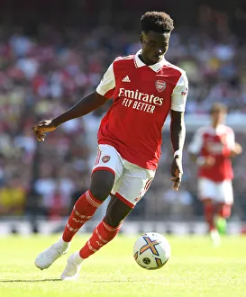 Arsenal's Bukayo Saka in Action: Arsenal vs. Leicester City, 2022-23 Premier League Clash at Emirates Stadium