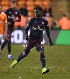 Arsenal's Bukayo Saka in Action against Blackpool in FA Cup Third Round