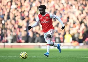 Arsenal v Chelsea 2019-20 Collection: Arsenal's Bukayo Saka in Action Against Chelsea in the Premier League