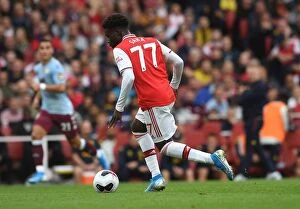 Arsenal v Aston Villa 2019-20 Collection: Arsenal's Bukayo Saka in Action: Premier League 2019-20 - Arsenal vs. Aston Villa