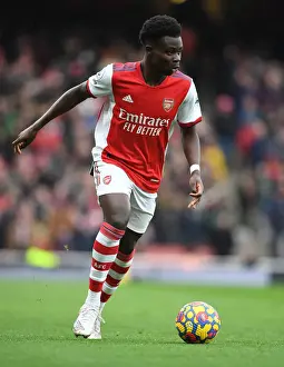 Arsenal's Bukayo Saka in Action: Premier League 2021-22 - Arsenal vs Newcastle United