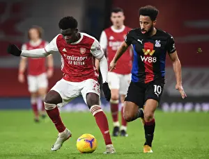 Arsenal's Bukayo Saka in Action: Premier League Clash Against Crystal Palace at Empty Emirates Stadium (2020-21)