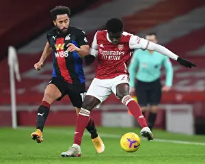 Arsenal's Bukayo Saka in Action: Premier League Clash Against Crystal Palace at Empty Emirates Stadium, 2020-21