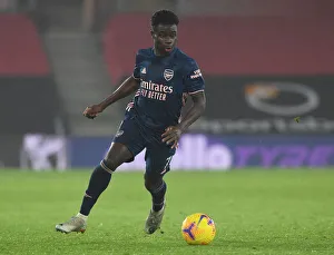 Southampton V Arsenal 2020-21 Prints: Arsenal's Bukayo Saka in Action against Southampton in Empty St