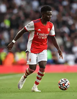 Arsenal's Bukayo Saka in Action against Tottenham Hotspur in the 2021-22 Premier League
