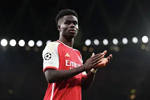 Arsenal V Sevilla 2023-24 Prints: Arsenal's Bukayo Saka Applauding Fans: Arsenal FC vs Sevilla FC