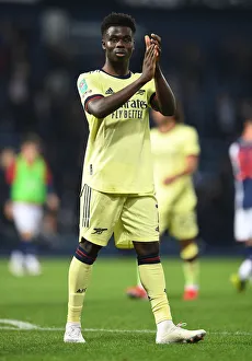 West Bromwich Albion V Arsenal - Carabao Cup 2021-22 Prints: Arsenal's Bukayo Saka Celebrates Carabao Cup Victory over West Bromwich Albion