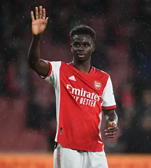 Arsenal's Bukayo Saka Celebrates with Fans after Arsenal v Southampton Victory (2021-22)