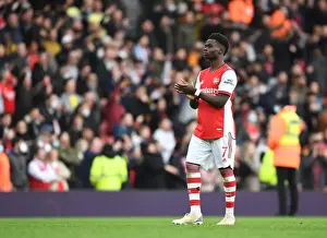 Arsenal's Bukayo Saka Celebrates with Fans After Hard-Fought Arsenal v Manchester City Match, Premier League 2021-22