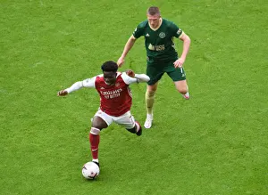 Arsenal's Bukayo Saka Clashes with Sheffield United's John Lundstram in Premier League Showdown