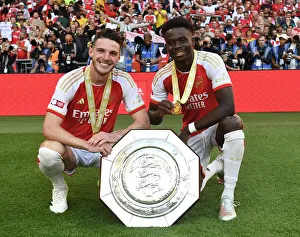 Arsenal's Bukayo Saka and Declan Rice Celebrate Community Shield Victory over Manchester City (2023-24)