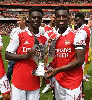 Arsenal V Sevilla - Emirates Cup 2022 Prints: Arsenal's Bukayo Saka and Eddie Nketiah Lift Emirates Cup after Arsenal v Sevilla Pre-Season Friendly