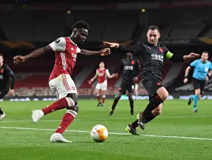Arsenal V Slavia Prague 2020-21 Prints: Arsenal's Bukayo Saka in Empty Europa League Quarterfinal: Arsenal vs Slavia Prague (2021)