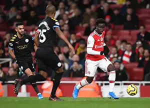 Arsenal V Manchester City 2019-20 Prints: Arsenal's Bukayo Saka Faces Manchester City in the Premier League