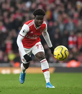 Arsenal's Bukayo Saka Faces Off Against Chelsea at the Emirates Stadium