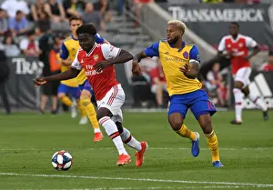 Arsenal's Bukayo Saka Faces Off Against Colorado Rapids Kellyn Acosta in 2019-20 Clash