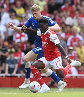 Arsenal's Bukayo Saka Faces Off Against Everton's Jarrad Branthwaite in Premier League Showdown