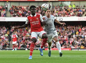 Arsenal V Liverpool 2022-23 Prints: Arsenal's Bukayo Saka Faces Off Against Liverpool in the Premier League