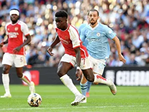 Arsenal's Bukayo Saka Faces Off Against Manchester City's Bernardo Silva in FA Community Shield Showdown