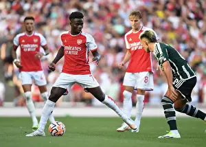Arsenal's Bukayo Saka Faces Off Against Manchester United in the Premier League (2023-24)
