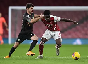 Arsenal V Burnley 2020-21 Prints: Arsenal's Bukayo Saka Faces Off Against Robbie Brady of Burnley in Premier League Clash