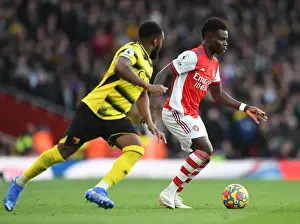 Arsenal V Watford 2021-22 Prints: Arsenal's Bukayo Saka Faces Off Against Watford's Danny Rose in Premier League Clash