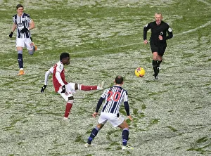 West Bromwich Albion V Arsenal 2020-21 Prints: Arsenal's Bukayo Saka Fends Off West Bromwich Albion's Branislav Ivanovic: Premier League Clash