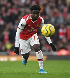 Arsenal's Bukayo Saka Goes Head-to-Head with Chelsea in Intense Premier League Showdown