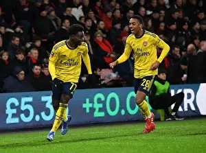 Arsenal's Bukayo Saka and Joe Willock Celebrate Goal in FA Cup Fourth Round Against AFC Bournemouth