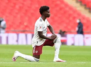 Arsenal's Bukayo Saka Kneels During FA Community Shield Match Against Liverpool
