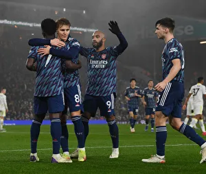 Arsenal's Bukayo Saka, Martin Odegaard, Alex Lacazette, and Kieran Tierney Celebrate Goals Against Leeds United in Premier League (December 2021)