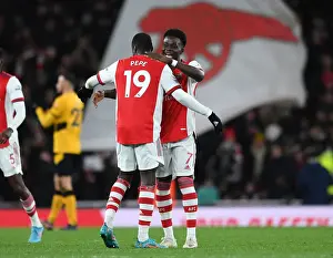 Arsenal's Bukayo Saka and Nicolas Pepe Celebrate Goal vs. Wolverhampton Wanderers (2021-22)