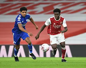 Arsenal's Bukayo Saka Outwits Leicester's James Justin in Empty Emirates Stadium